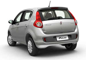銀色 Fiat Palio 緊湊型汽車，從後方四分之三角度觀看，在攝影棚環境中。 — 飛雅特 壁紙