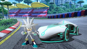 Silver the Hedgehog 在他發光的賽車旁邊，在色彩繽紛的賽道上。 — 銀刺蝟 壁紙