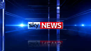 Sky News 標誌在高科技藍色廣播攝影棚中，帶有鏡頭光暈。 — 霓虹燈 壁紙