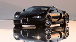 黑色Bugatti超級跑車在黃金時刻濕滑路面上的倒影。 — 布加迪 GIF 壁紙