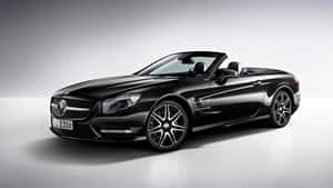 黑色梅賽德斯 SL 敞篷跑車在攝影棚中配銀色輪圈 — Mercedes-Benz 壁紙