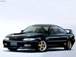 黑色豐田Celica GT-Four配金色輪圈於工作室環境 — 馬自達 壁紙