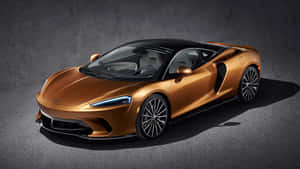 銅色McLaren跑車，黑色車頂和發光頭燈，在攝影棚內。 — 福特 壁紙