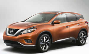 工作室環境中的銅色日產Murano SUV，帶有銀色飾邊和黑色車輪。 — 日產 壁紙