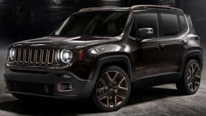 深棕色Jeep Renegade SUV，帶有青銅飾邊和合金輪圈，在工作室環境中。 — 吉普 壁紙
