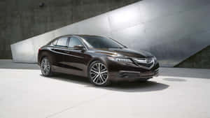 深棕色豪華轎車停靠在混凝土和金屬牆旁。 — Acura 壁紙