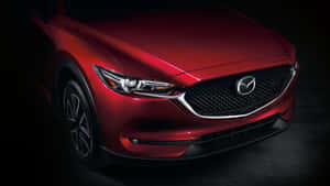 紅色Mazda SUV在黑暗工作室燈光下的正面視圖 — 馬自達 壁紙