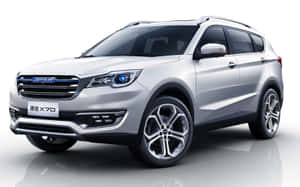 銀色Jetour X70 SUV，配備藍色頭燈和合金輪圈，位於反射攝影棚地板上。 — Steam Deck OLED 壁紙