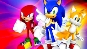 色彩繽紛的動漫風格 Sonic、Knuckles 和 Tails 英勇地擺姿勢。 — 音速小子 壁紙