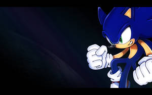 Sonic the Hedgehog 以戰鬥姿勢緊握拳頭站在深色背景前。 — 電玩遊戲 GIF 壁紙