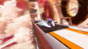 Sonic the Hedgehog 穿過一個以糖果為主題的關卡，內有巨型甜甜圈和粉紅色的雲。 — 音速小子 壁紙