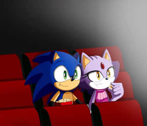 Sonic 和 Amy 在電影院裡看電影，吃著爆米花。 — 音速小子 壁紙