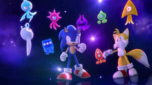 Sonic 和 Tails 在太空中，有發光的外星生物在他們周圍漂浮。 — 電玩遊戲 GIF 壁紙