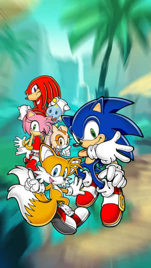 Sonic 和他的朋友們在叢林場景中，帶有動態模糊。 — 音速小子 壁紙
