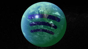 太空中疊加了 Spotify 標誌的地球。 — Spotify 壁紙