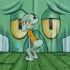 Squidward 在綠色窗簾下的木地板上流淚哭泣。 — 章魚哥的觸手 壁紙