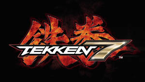 Tekken 7 遊戲標誌，黑色背景上帶有火熱橙色和紅色的風格化文字 — 鐵拳 壁紙