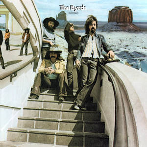 The Byrds 樂團在沙漠景觀中的彎曲樓梯上。 — 岩石 壁紙