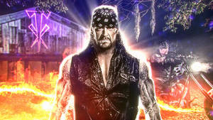 摔角手 The Undertaker 與火焰摩托車和霓虹符號在黑暗的火焰場景中。 — 送葬者 壁紙