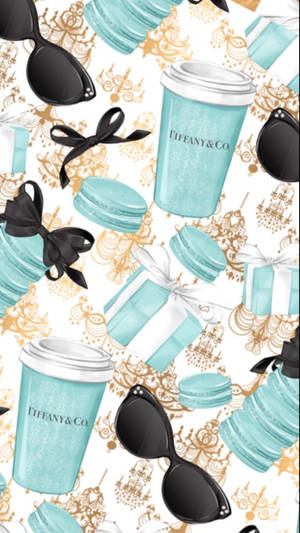 金色圖案背景上的 Tiffany 藍色咖啡杯、馬卡龍和太陽眼鏡。 — 蒂芙尼藍 壁紙