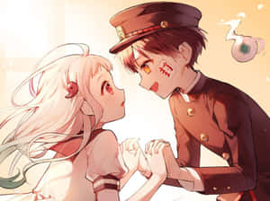 兩個動漫角色在溫暖的光芒中牽手擁抱。 — 艾瑪·華森 壁紙