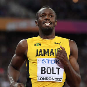 Usain Bolt 穿著牙買加球衣慶祝2017年倫敦田徑比賽勝利。 — 運動 壁紙