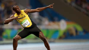 Usain Bolt 穿著牙買加球衣慶祝田徑比賽勝利。 — 運動 壁紙