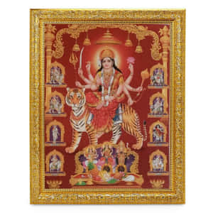 印度教女神杜爾迦多臂騎虎，手持武器和象徵物。 — Maa Durga 壁紙