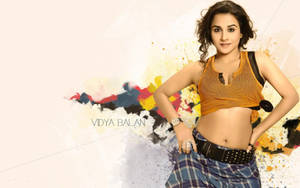 女演員 Vidya Balan 穿著休閒服裝，背景是油漆飛濺圖案。 — 維迪亞·巴蘭 壁紙