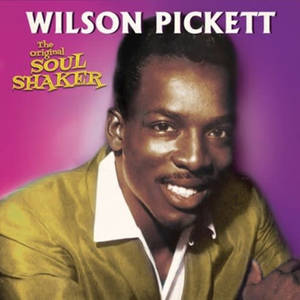 Wilson Pickett 身穿金色外套微笑，紫色背景和靈魂音樂文字。 — 音樂 壁紙