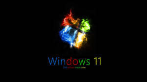 Windows 11 標誌在黑色背景上呈現火熱色彩，附有標語。 — Windows 11 4K 壁紙