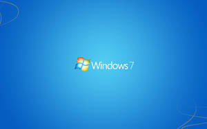 Windows 7 標誌在漸變藍色背景上，帶金色漩渦裝飾。 — 藍色美學電腦 壁紙