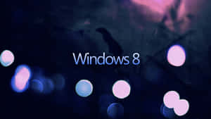 Windows 8 標誌在深色背景上帶有發光的散景燈光 — Windows 11 4K 壁紙