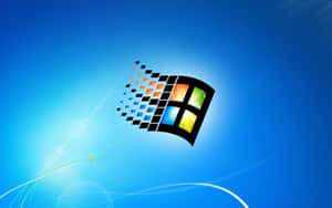 Windows 標誌，帶有像素化軌跡，背景為漸變藍色 — 深色窗戶 壁紙