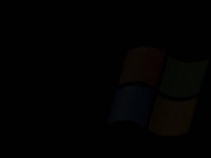 Windows 標誌在深色背景下柔和發光。 — 深色窗戶 壁紙