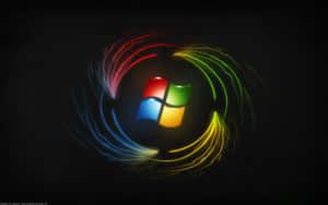 Windows 標誌在黑色背景上被彩色發光光跡環繞。 — 霓虹 壁紙