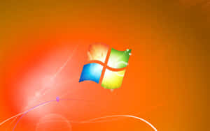 Windows 標誌帶有彩色面板，在發光的橙色背景上帶有光條。 — 美麗的秋天 壁紙