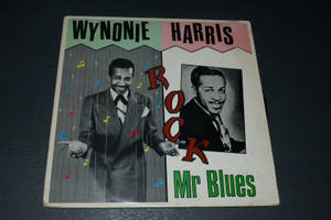 Wynonie Harris 的復古專輯《Rock Mr Blues》封面，帶有音符和大膽字體。 — 音樂 壁紙