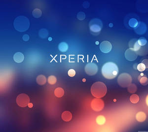 Xperia 標誌搭配彩色模糊燈光背景 — Sony 壁紙