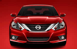 紅色日產轎車正面視圖（攝影棚） — 日產 壁紙