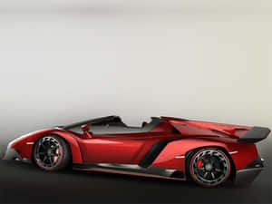 帶有黑色飾件和空氣動力學設計的紅色藍寶堅尼 Veneno Roadster。 — 蘭博基尼 壁紙