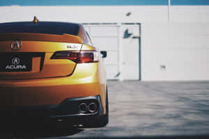 黃金Acura ILX跑車停在白色車庫門前。 — Acura 壁紙