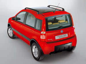 紅色Fiat Panda 4x4 Multijet緊湊型SUV，配備黑色車頂行李架和銀色輪圈。 — 可愛熊貓 壁紙