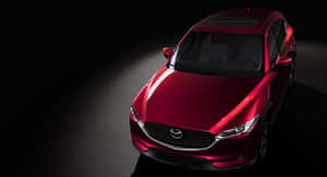 紅色Mazda SUV在黑暗工作室中受聚光燈照射 — 馬自達 壁紙
