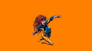 一位身穿藍金色套裝的女超級英雄，紅髮飛揚，向前躍進。 — 生氣 壁紙