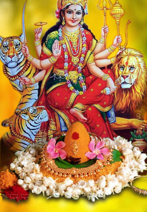 多臂印度教女神，被老虎和獅子環繞，飾以珠寶和鮮花。 — Maa Durga 壁紙