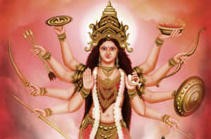 一位多臂印度教女神以神聖姿態手持武器和象徵物。 — Maa Durga 壁紙