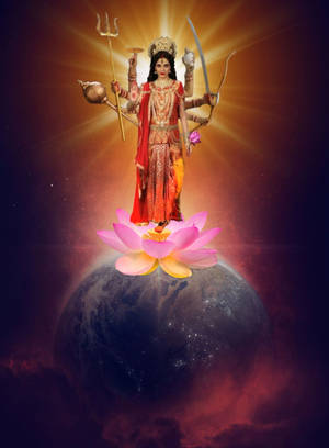 多臂女神站在地球上的蓮花上，散發著天國的光芒。 — 太空 壁紙
