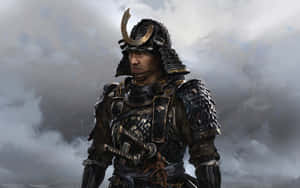 全副武裝的武士站在風暴天空下。 — 對馬戰鬼 壁紙