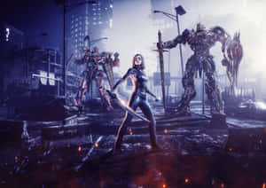 女戰士手持發光劍，面對巨型機器人，在破壞的夜晚城市場景中。 — 艾莉塔：戰鬥天使 壁紙